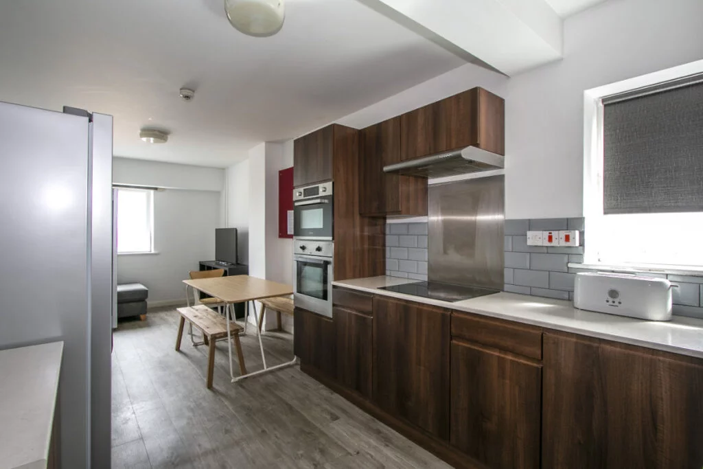 Typical shared flat lounge and kitchen in Winton Halls student accommodation
